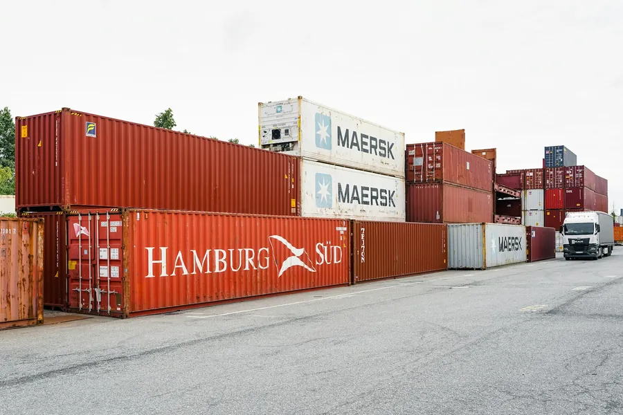 Containers stacked in an industrial yard